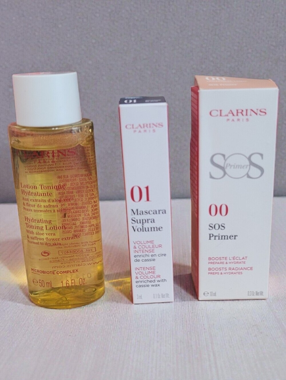 Clarins 3 Pc Travel Size Lot Toner SOS Primer 00 Mascara Supra Volume New